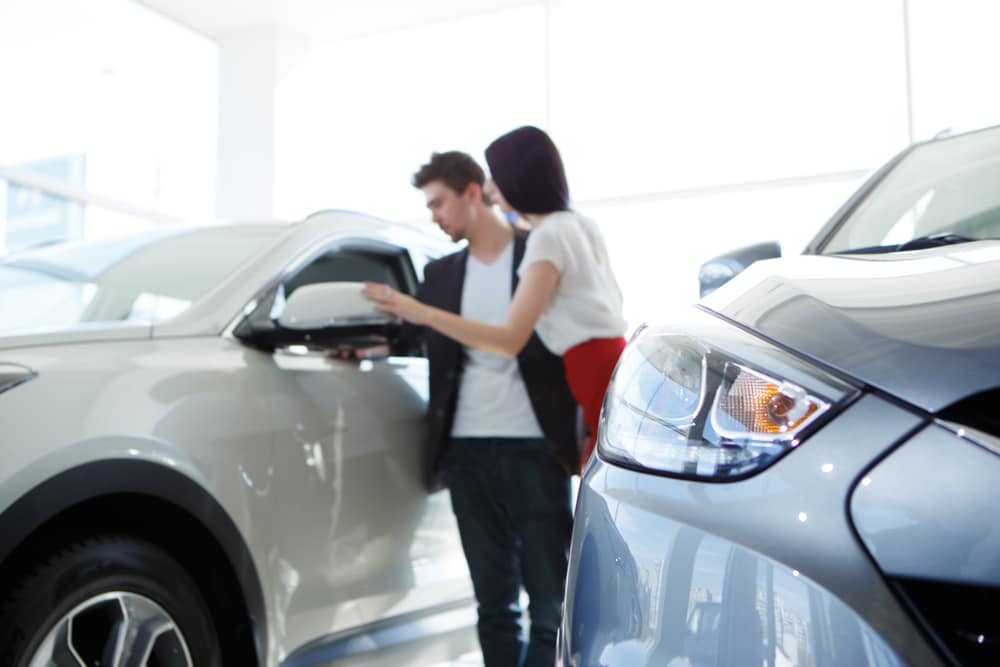 Couple shopping for new car