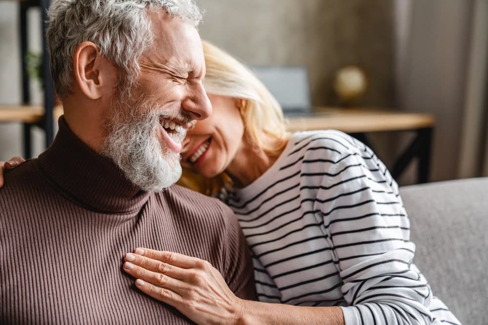 Funeral Insurance Banner - Senior couple laughing together