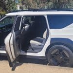 White Kia EV9 side view with doors open