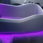 Kia EV9 interior centre console backlit.