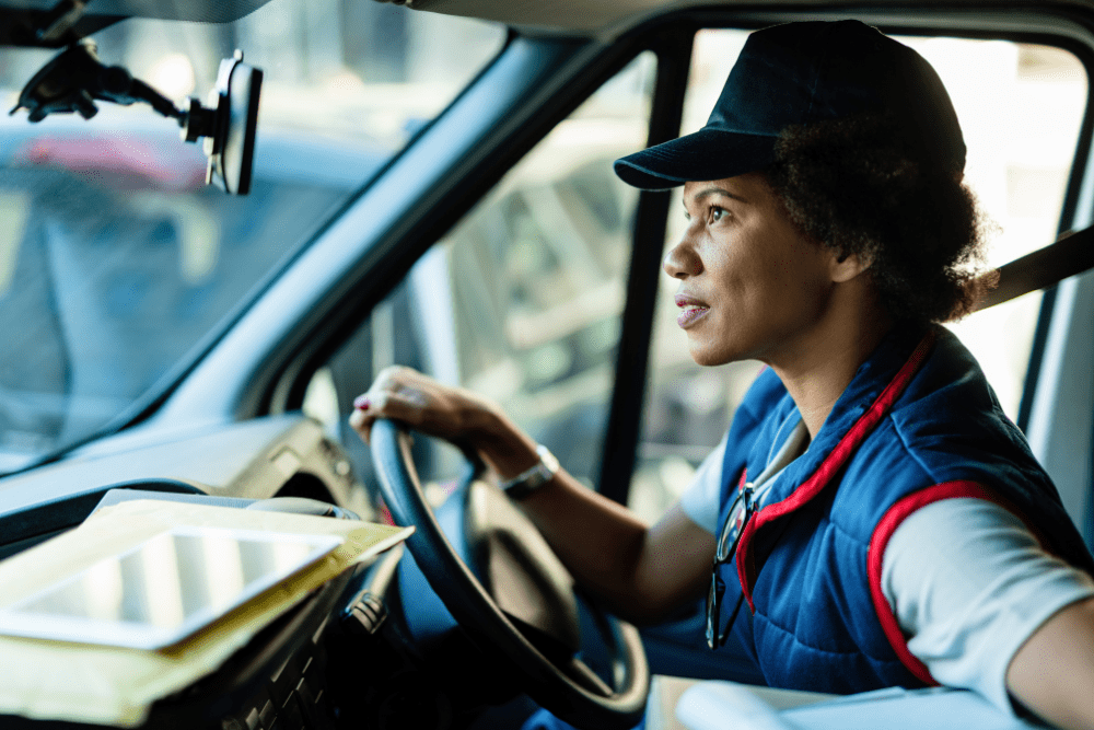 Deliverywoman driving a van