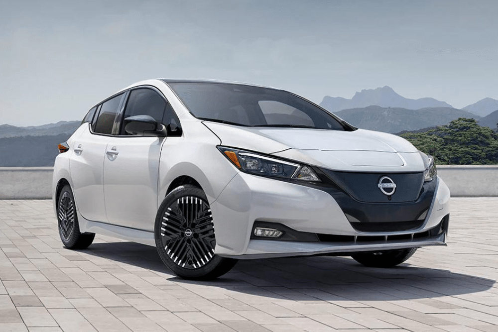 White Nissan leaf outside