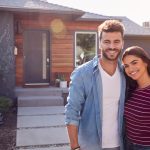 A Happy Couple in front of their new house