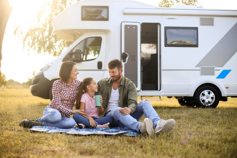 Family picnic in front of motorhome