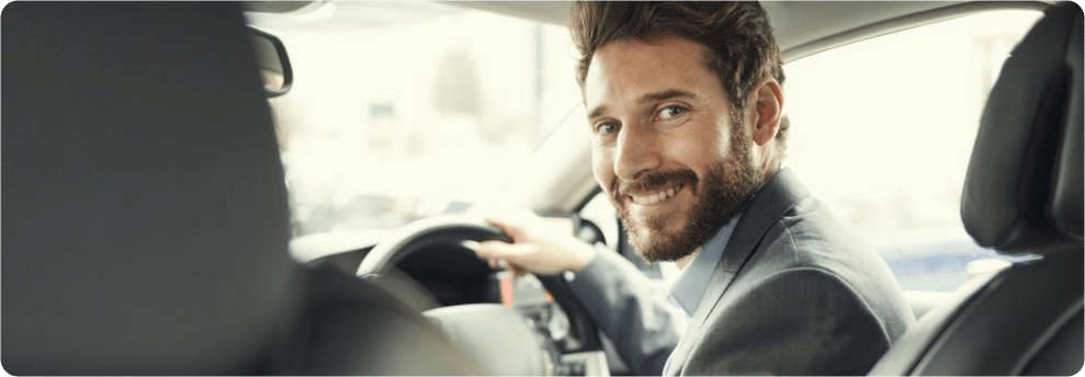 Businessman driving his car for work