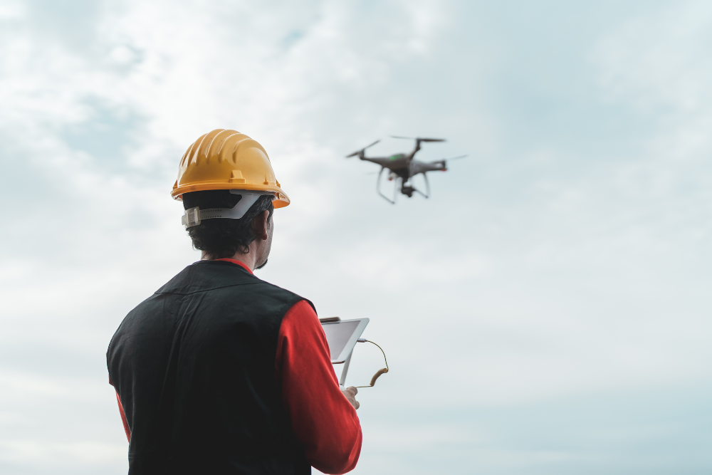 Man operating drone