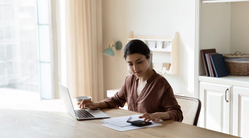 Woman researching savings accounts online