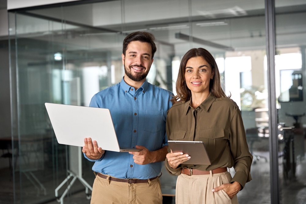 Business partners with their laptop and device