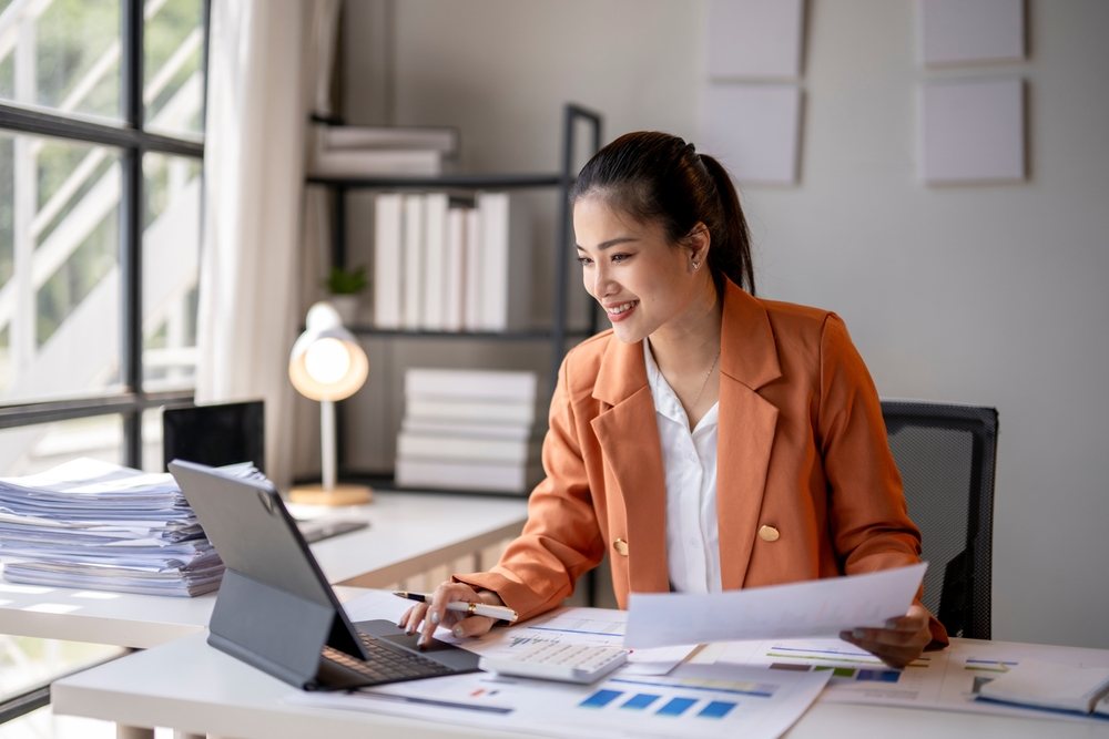 Businesswoman on her laptop at her desk