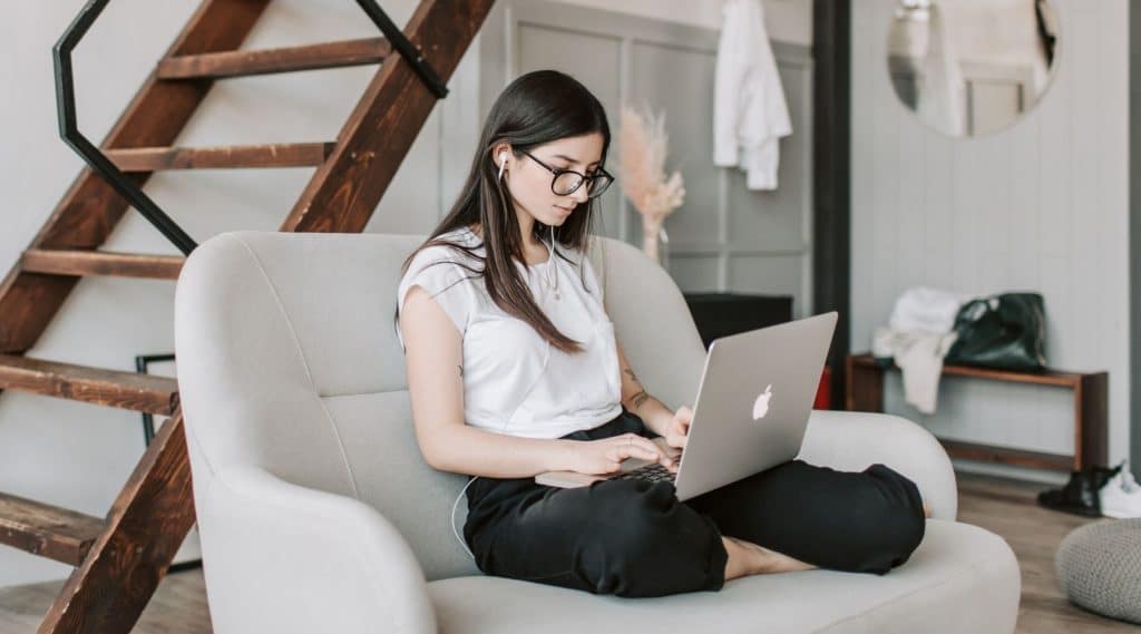 Woman on her laptop at home
