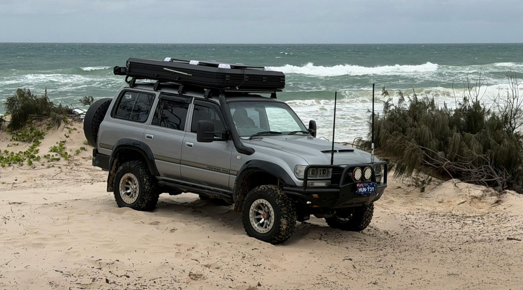 4WD car on the beach