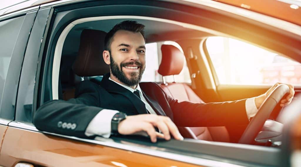 Businessman driving his car