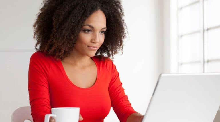 Woman looking at her laptop