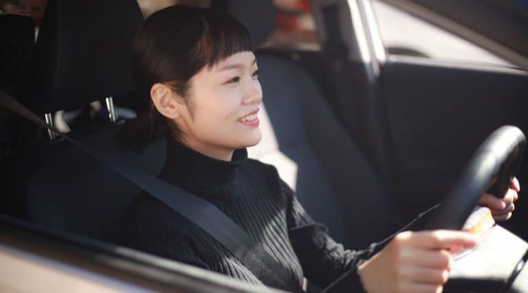 Woman driving her car