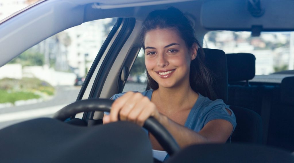 Woman driving her car