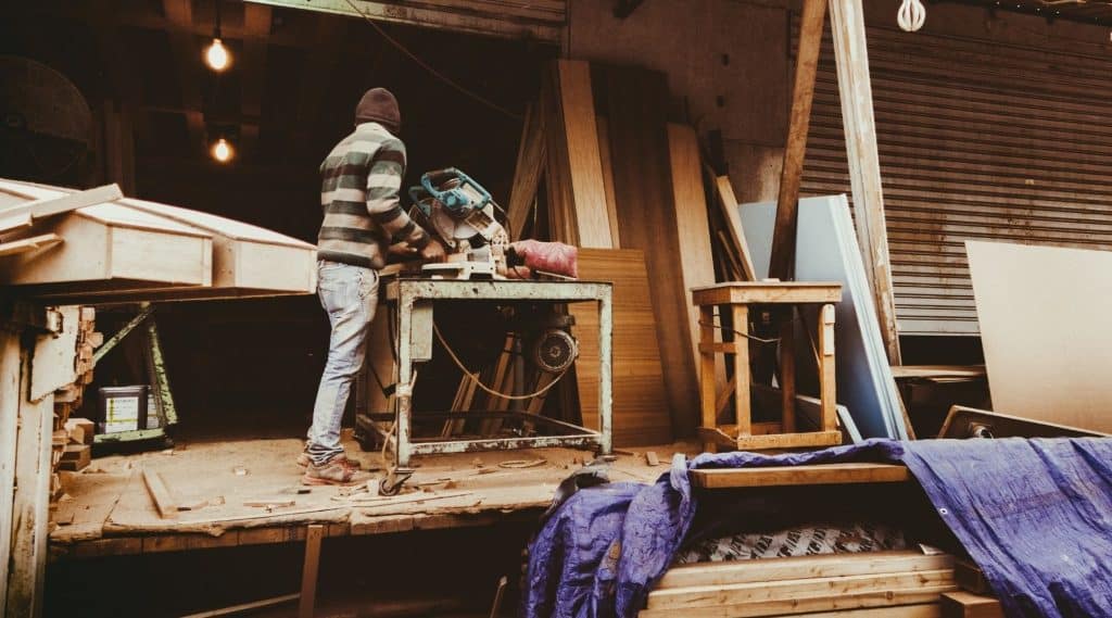 Carpenter working at his workshop