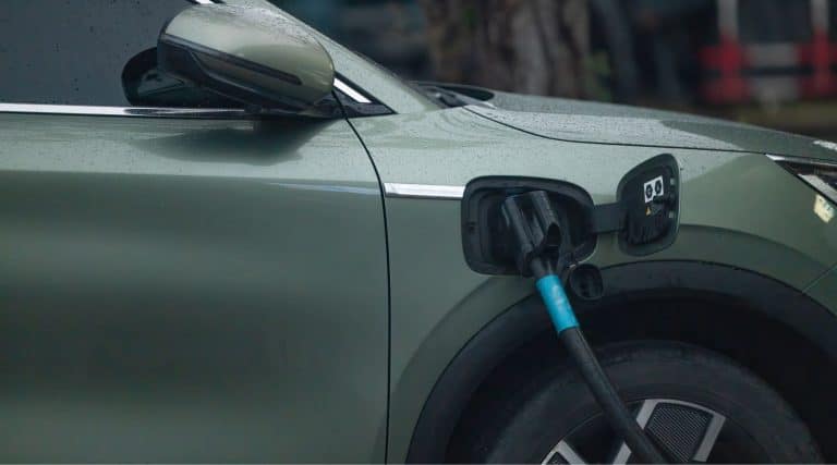 Electric car being charged