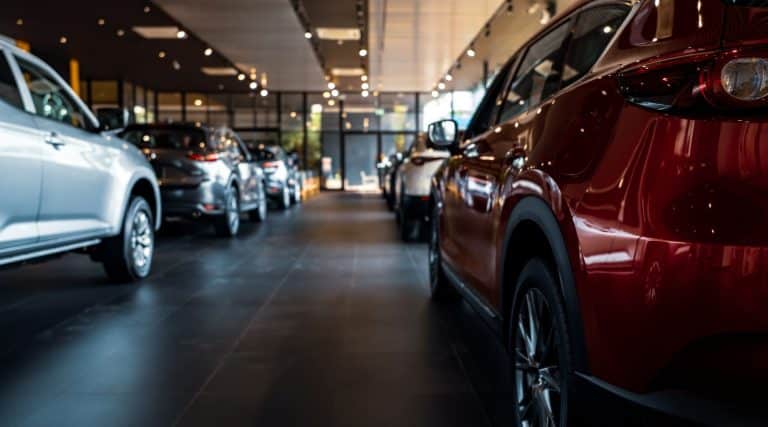 Cars lined up in a showroom