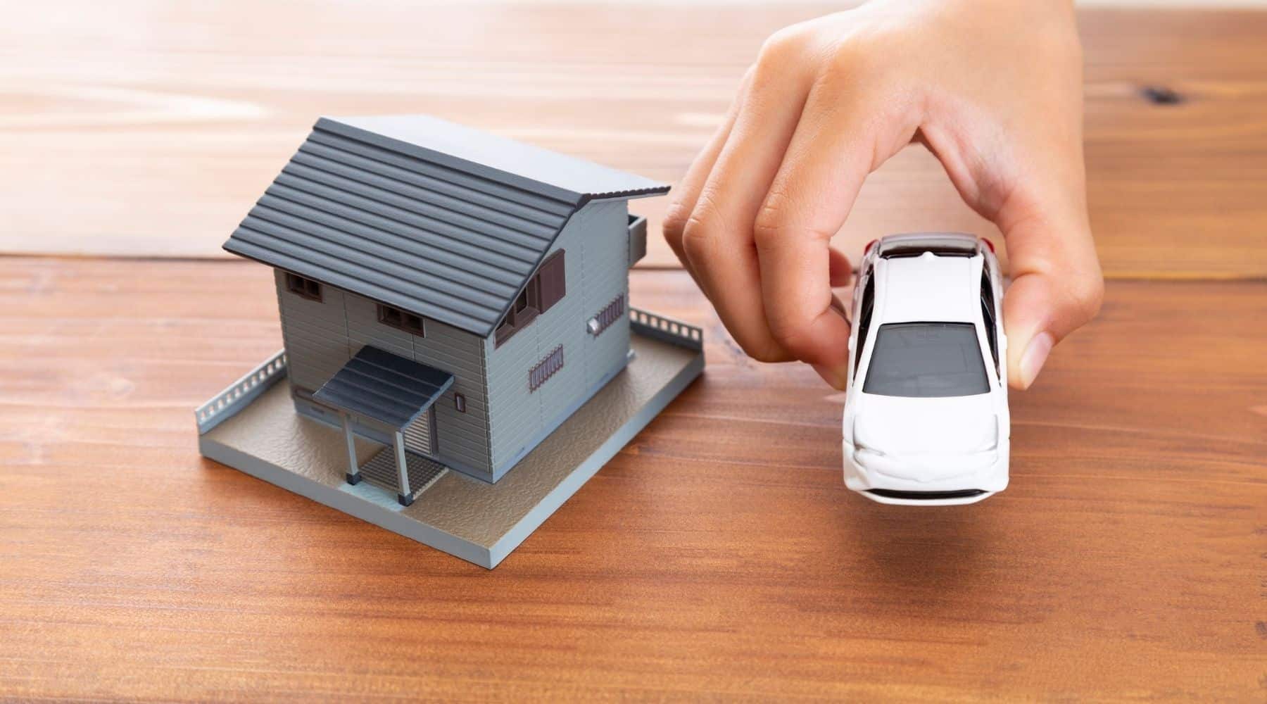 A model home and car placed together