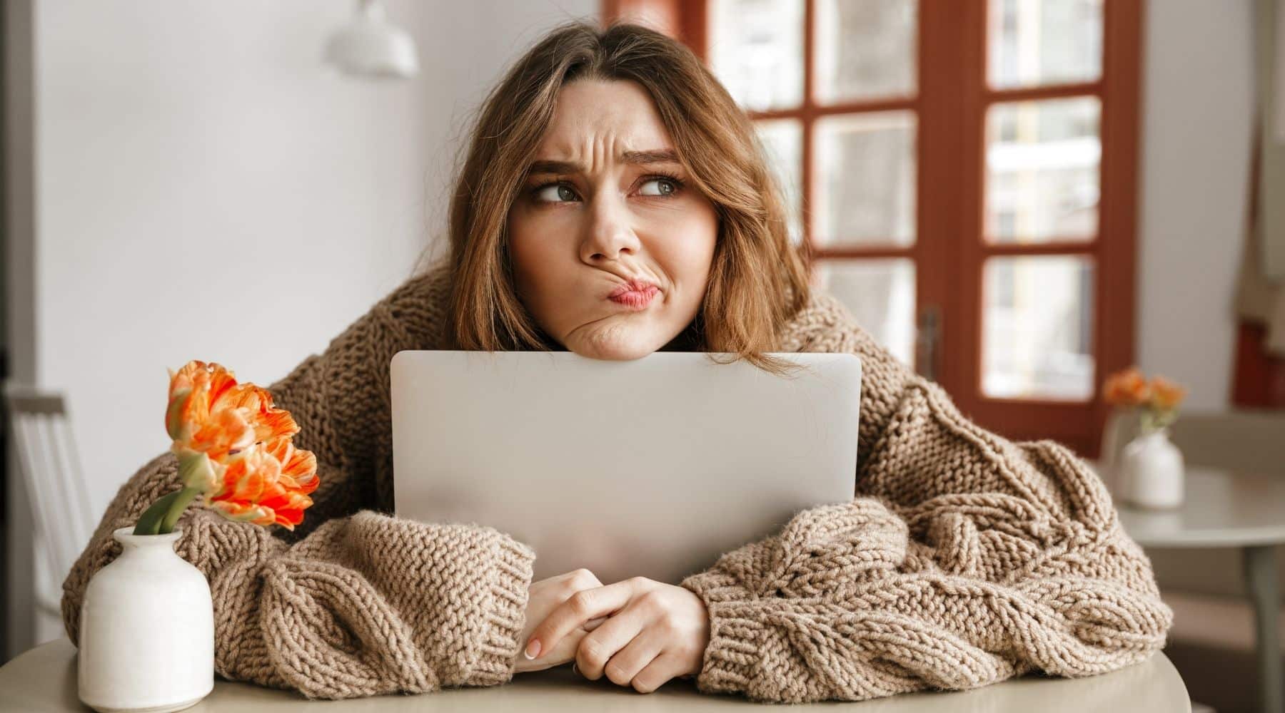 Confused woman with laptop