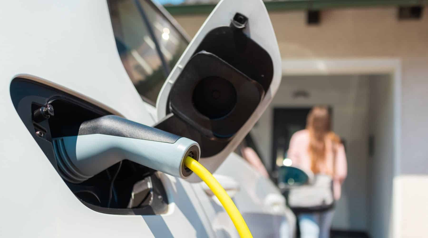 An EV plugged into charge