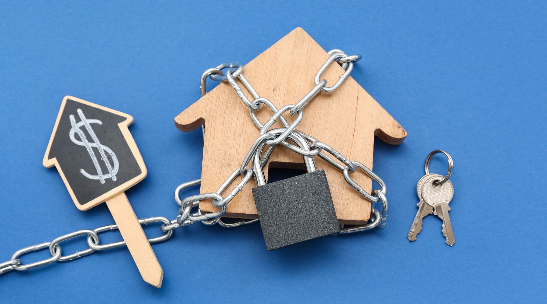 Little house wrapped in chains and padlocked